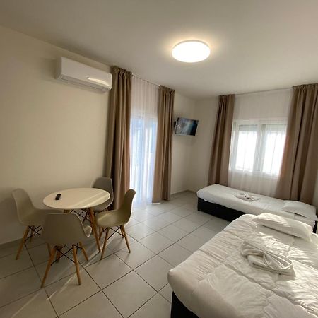 Opalium Beach Front Suites ポトス エクステリア 写真