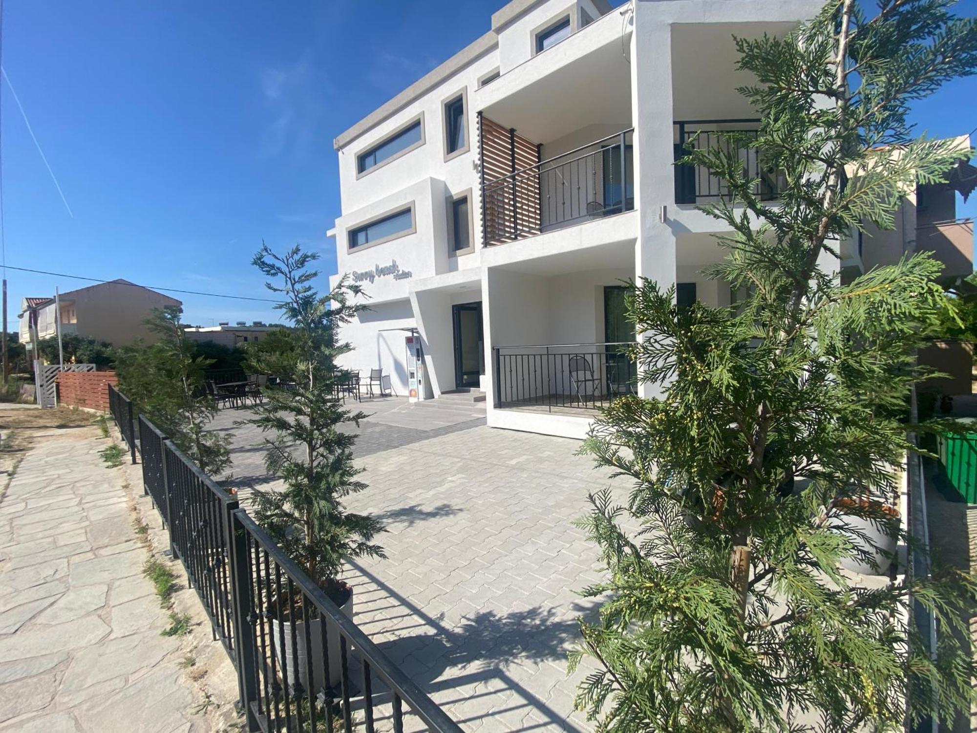 Opalium Beach Front Suites ポトス エクステリア 写真