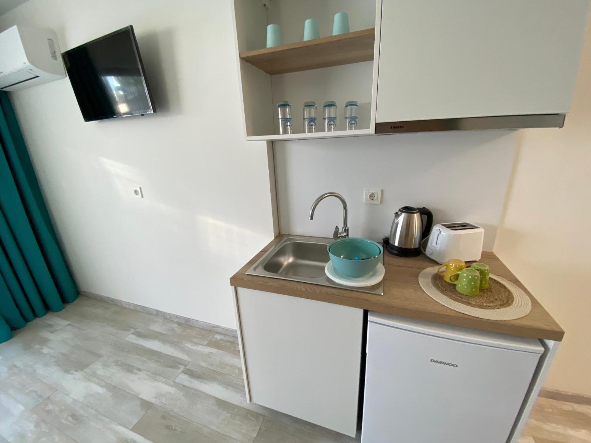 Opalium Beach Front Suites ポトス エクステリア 写真