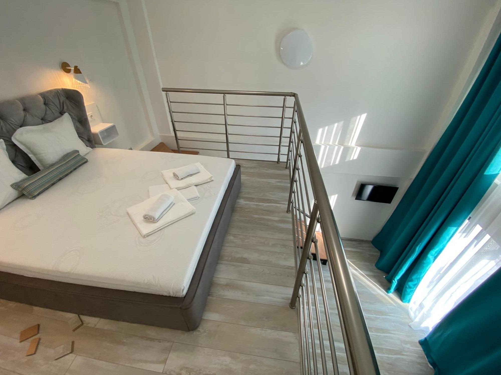 Opalium Beach Front Suites ポトス エクステリア 写真