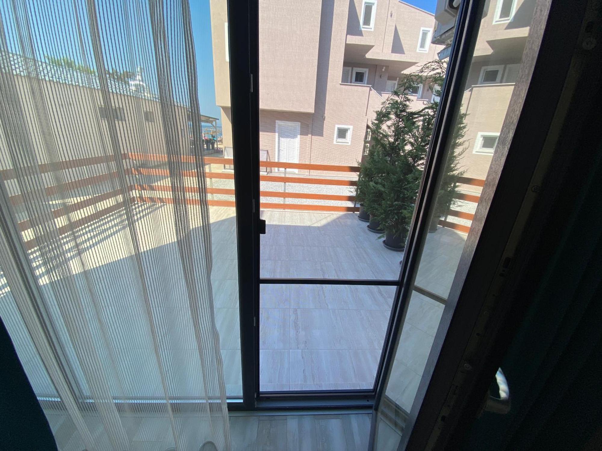 Opalium Beach Front Suites ポトス エクステリア 写真