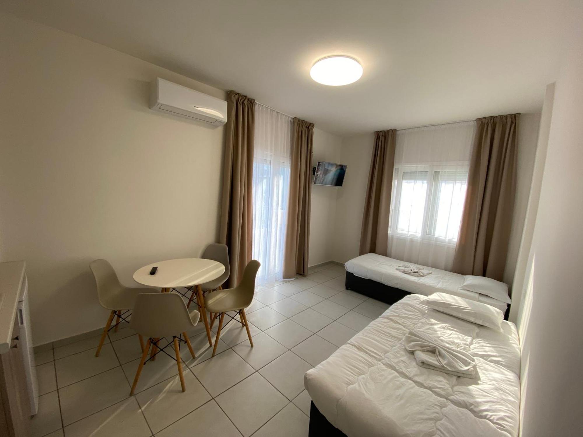 Opalium Beach Front Suites ポトス エクステリア 写真